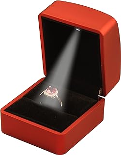 soft glow of a red LED proposal ring box nestled in your hand, ready to unveil a symbol of everlasting love.