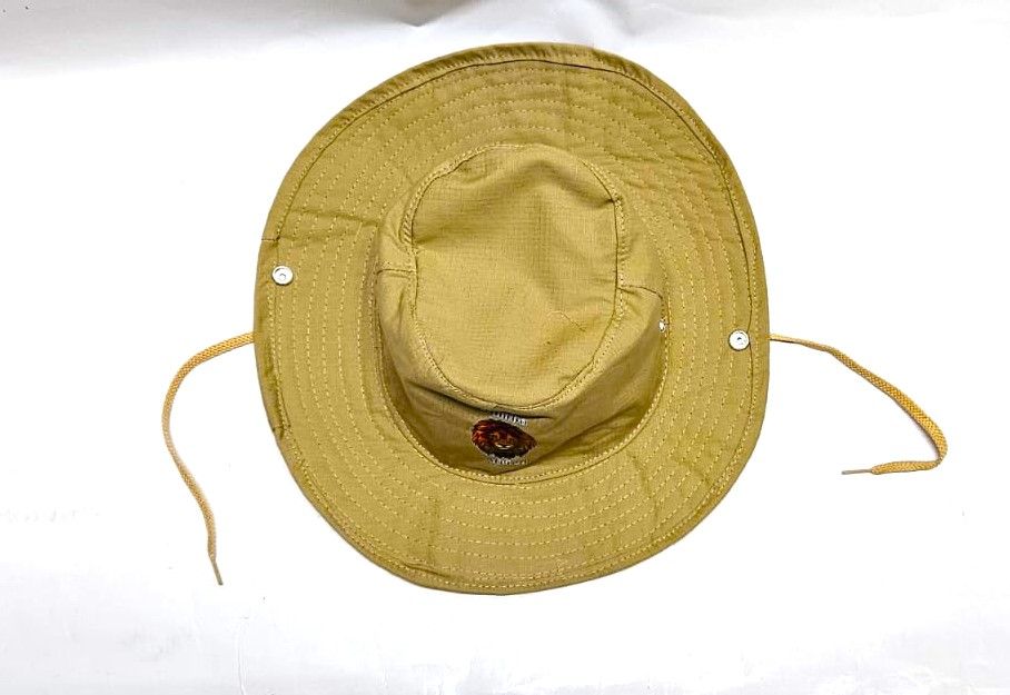 brown safari hat Crafted from high-quality, durable materials  blends practicality with a touch of sophistication