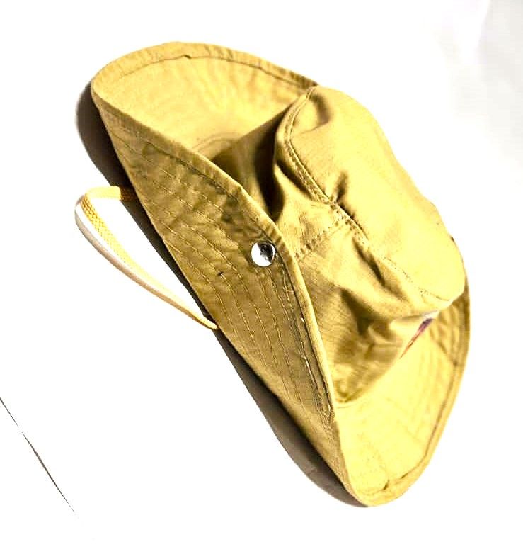 brown safari hat Crafted from high-quality, durable materials  blends practicality with a touch of sophistication
