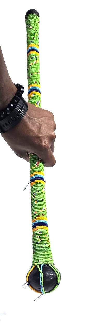 green multicolor beaded rungu is a striking representation of traditional African craftsmanship blending cultural significance with vibrant aesthetics