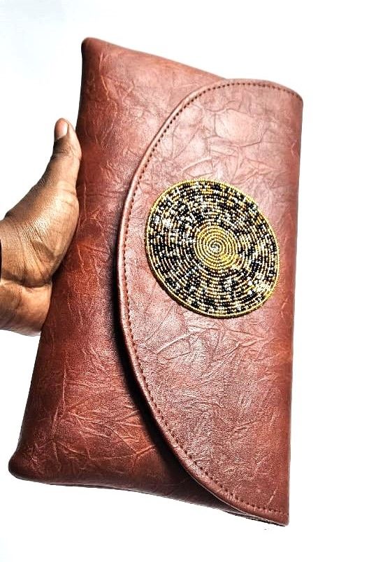 elegant brown stylish clutch bag, a perfect blend of sophistication and modern flair designed for the contemporary woman