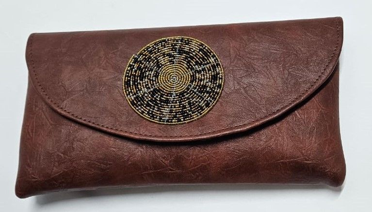 elegant brown stylish clutch bag, a perfect blend of sophistication and modern flair designed for the contemporary woman