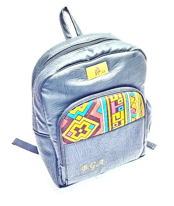 striking black leather backpack, a fusion of modern sophistication and vibrant cultural flair. This unique accessory is designed for the contemporary