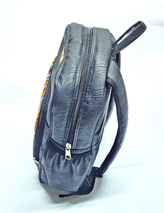 striking black leather backpack, a fusion of modern sophistication and vibrant cultural flair. This unique accessory is designed for the contemporary