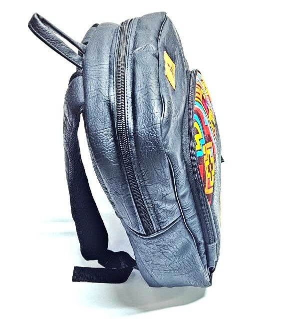 striking black leather backpack, a fusion of modern sophistication and vibrant cultural flair. This unique accessory is designed for the contemporary