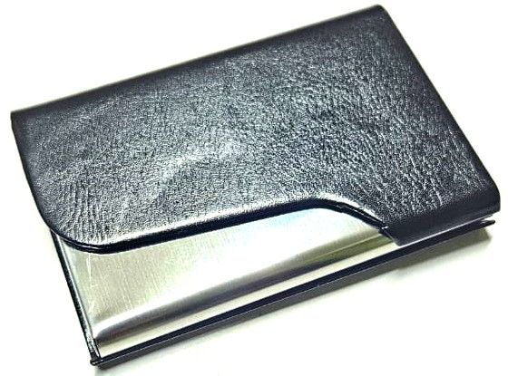 sophisticated black card holder, a perfect blend of elegance and practicality. Crafted from high-quality leather,