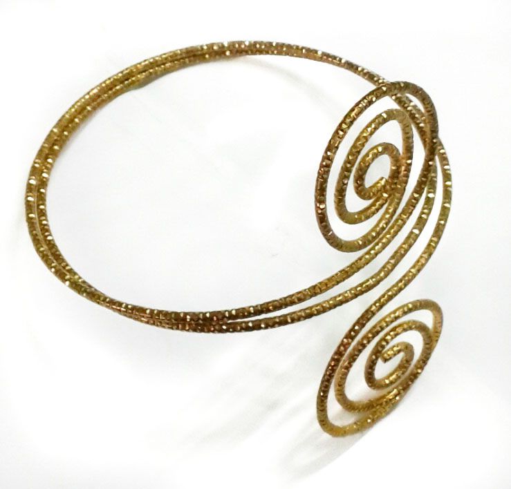The golden armlet for ladies is a stunning piece of jewelry that effortlessly combines elegance and sophistication