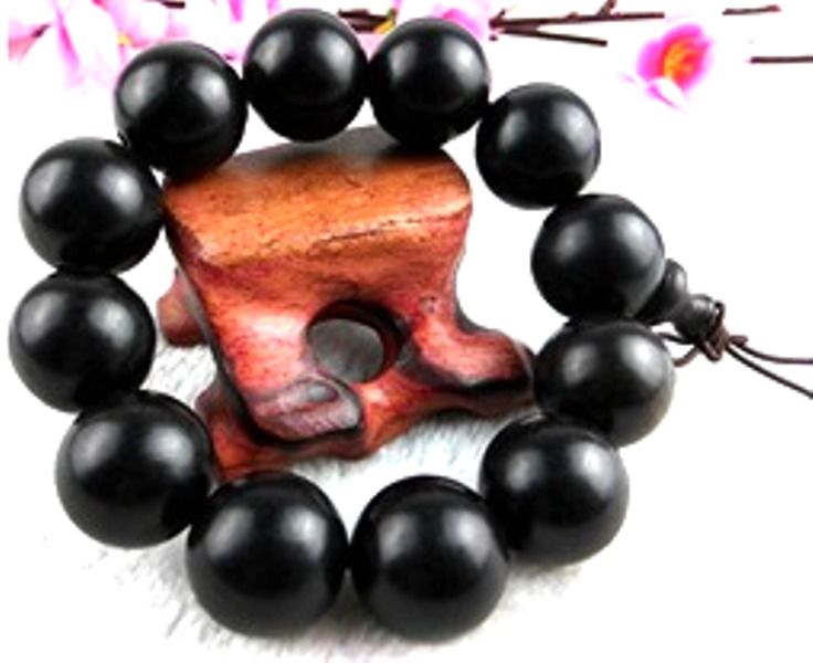 black Shamballa bracelet is a striking piece of jewelry that effortlessly blends elegance with spirituality