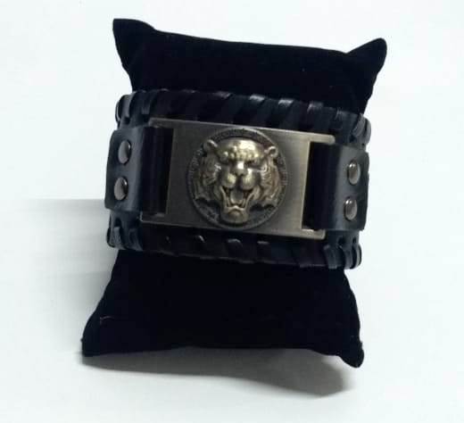 thick engraved leather bracelet for men, a striking accessory that seamlessly blends rugged style with a powerful symbol of strength