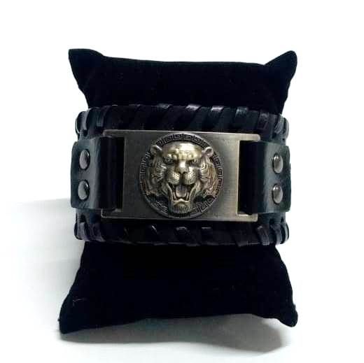 thick engraved leather bracelet for men, a striking accessory that seamlessly blends rugged style with a powerful symbol of strength