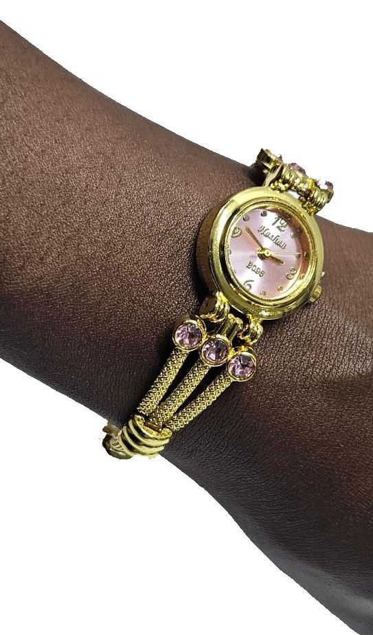 A ladies gorgeous unique and classic golden pink watch which is beautiful and easy to wear and it is durable and long lasting
