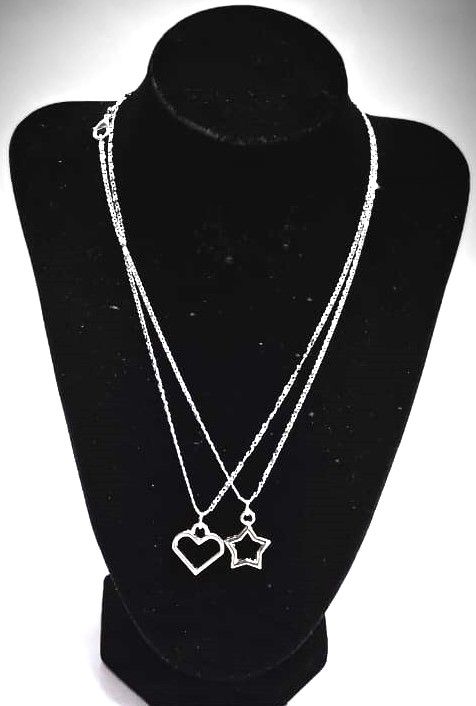 A double silver chain necklace of a love and star very fashionable and unique to have and is durable