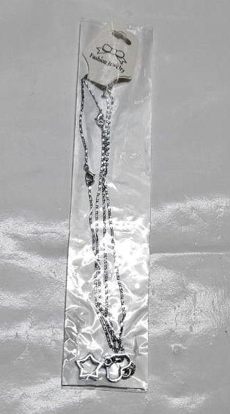 A double silver chain necklace of a love and star very fashionable and unique to have and is durable