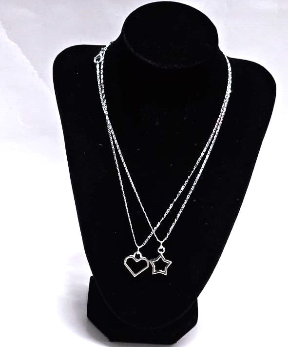 A double silver chain necklace of a love and star very fashionable and unique to have and is durable