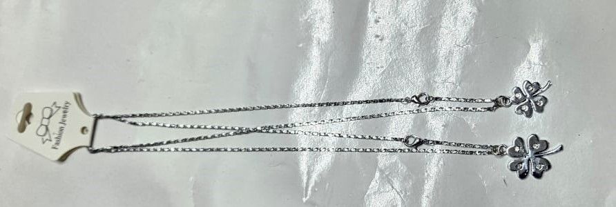 A double /couple flower silver chain necklace easy and comfortable to wear and it is durable and fashionable