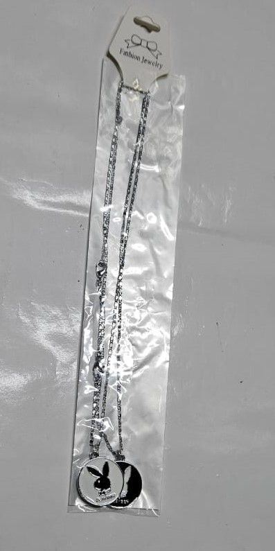A couple silver chain necklace with a rabbit symbol very beautiful and fashionable to have and it is durable