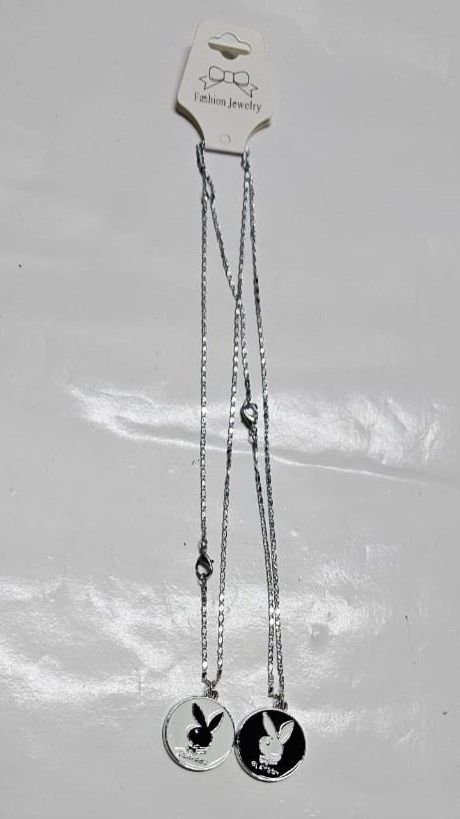A couple silver chain necklace with a rabbit symbol very beautiful and fashionable to have and it is durable
