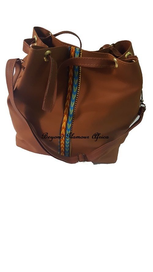 Women's brown leather Ankara handbag easy and comfortable to carry and is very fashionable to have are readily available with affordable prices