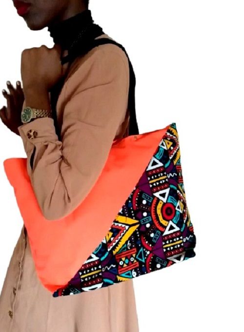 Women's orange canvas Ankara handbag easy and comfortable to carry and is very fashionable and classic to have
