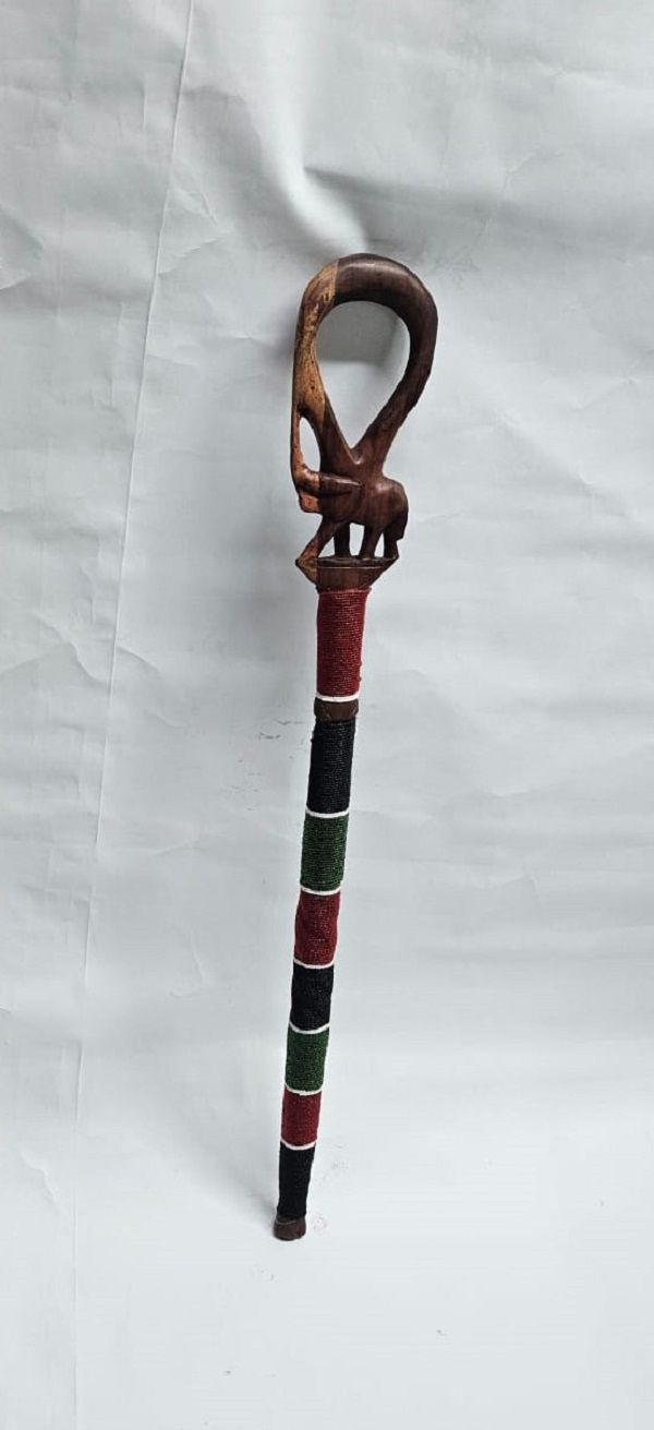 A kenyan beaded walking stick having an elephant design easy and comfortable to carry and is very fashionable to have