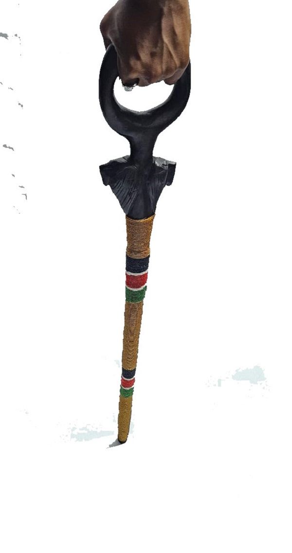 A black wooden beaded goldish, red ,white, black and green beads walking stick easy and comfortable to carry and is very fashionable
