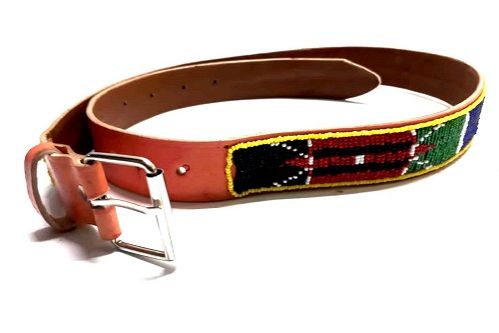 A Kenyan knitted scarf and a brown  beaded leather belt combo easy and comfortable and fashionable to have.