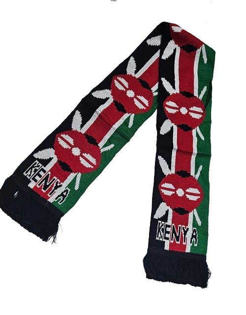 A Kenyan knitted scarf and a brown  beaded leather belt combo easy and comfortable and fashionable to have.