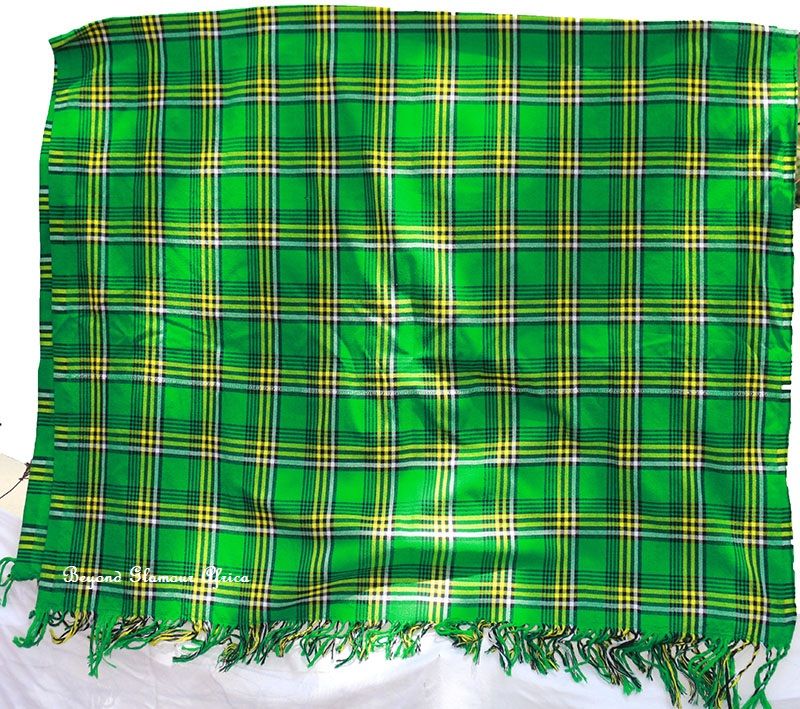 Ladies green shawl and a matching drop down earrings combo very comfortable and fashionable to have and are durable.