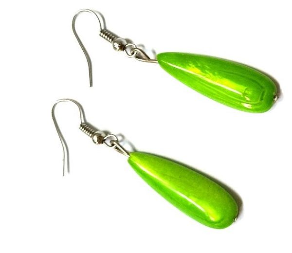 Ladies green shawl and a matching drop down earrings combo very comfortable and fashionable to have and are durable.