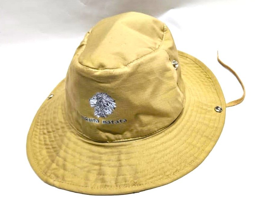 A beige safari hat and a black wooden rungu  combo very fashionable, durable and comfortable to have