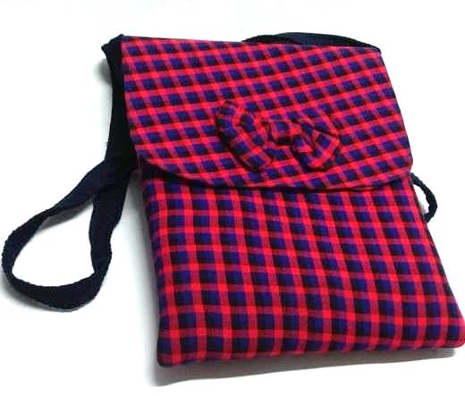 A blue pink sling bag and a blue knitted scarf very fashionable ,durable and comfortable to have.
