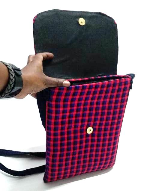 A blue pink sling bag and a blue knitted scarf very fashionable ,durable and comfortable to have.