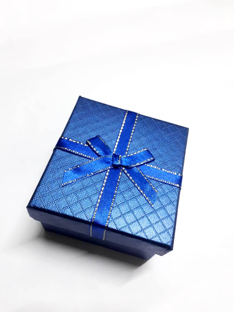 A blue cardboard gifting box very fashionable, classic and durable. Best for putting  gifts, and surprises.