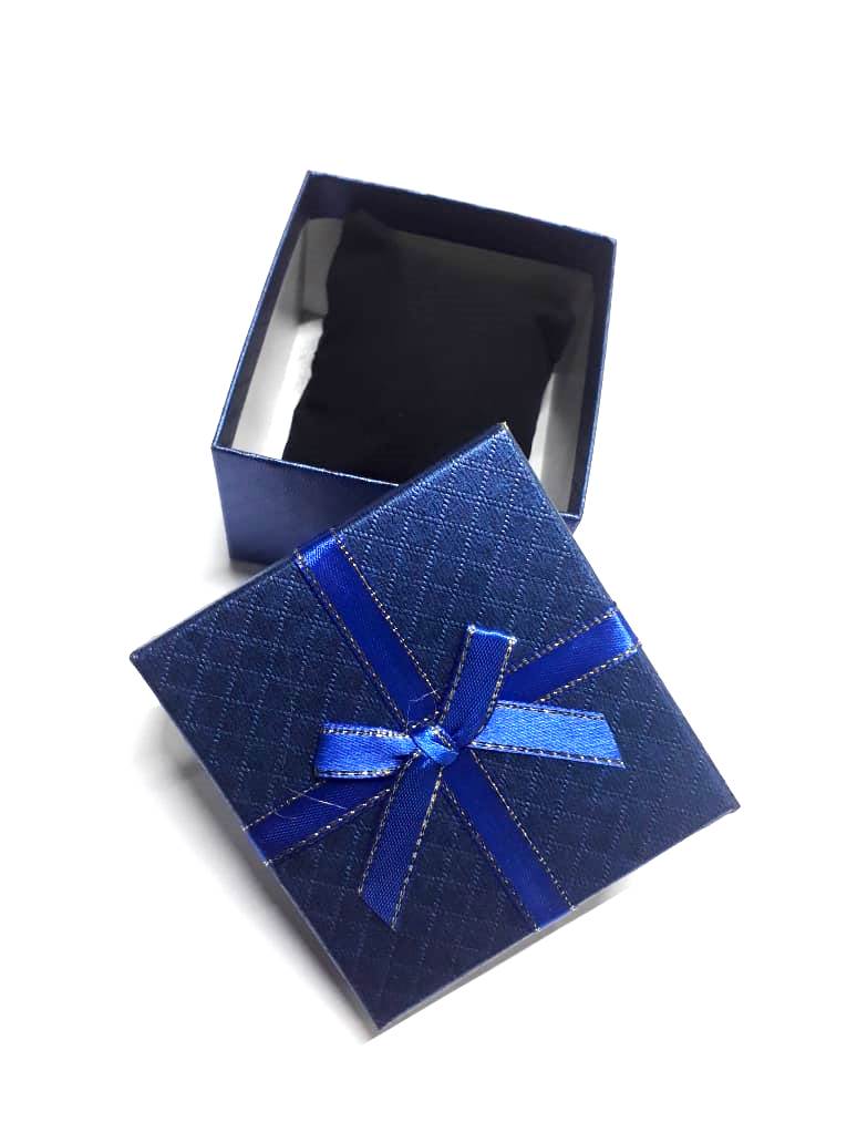 A blue cardboard gifting box very fashionable, classic and durable. Best for putting  gifts, and surprises.