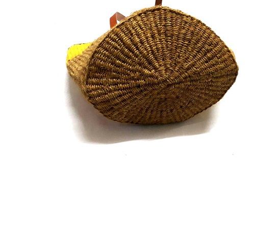 Ladies’ yellow African handcrafted sisal kyondo with leather straps and yellow crystal chandelier earrings combo very fashionable and durable .