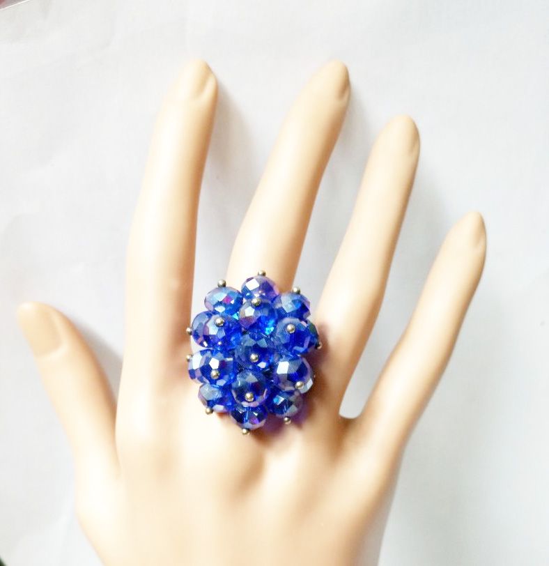 Women's blue crystal ring with metallic band  easy and comfortable and fashionable to have and are readily available
