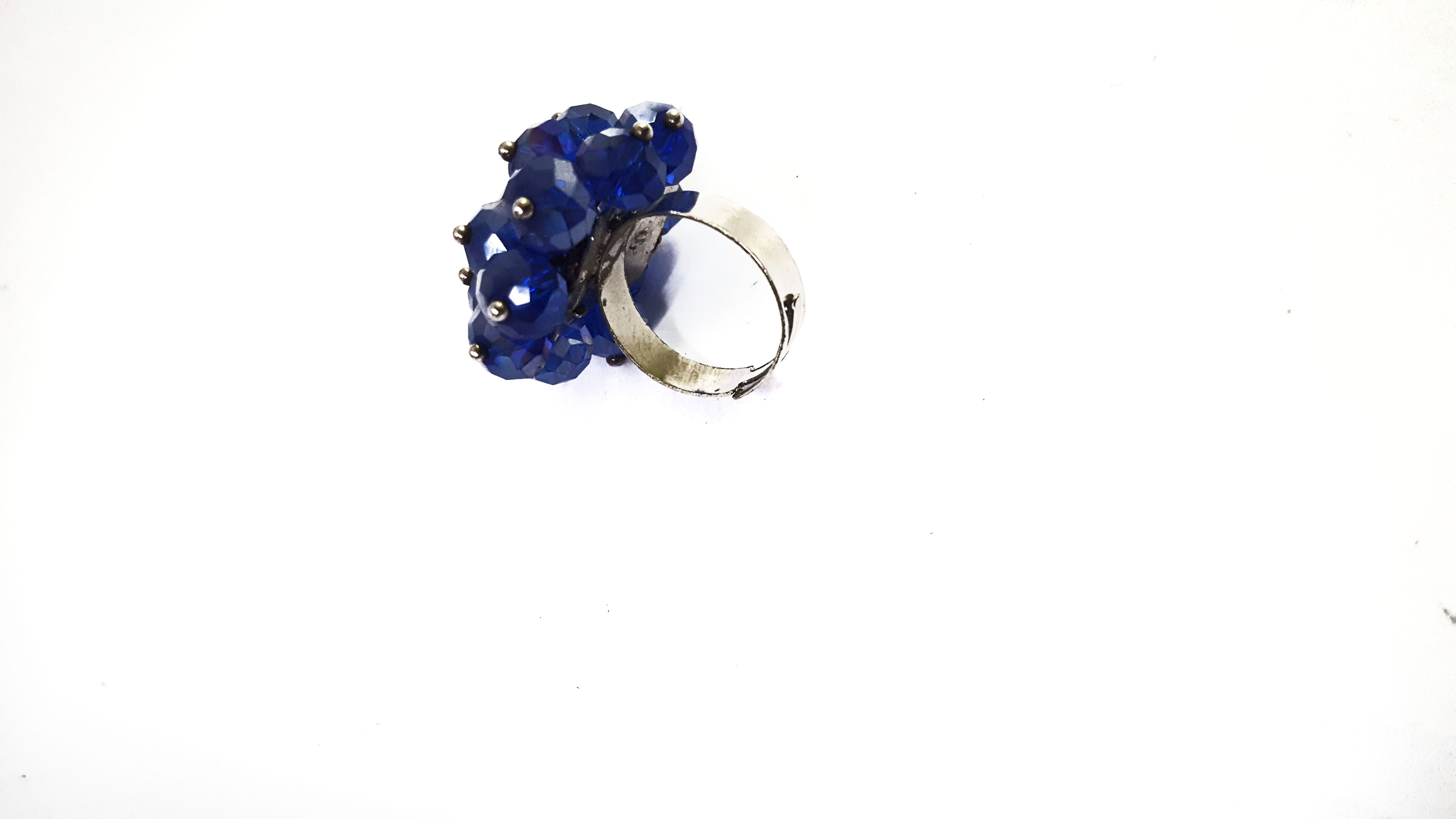 Women's blue crystal ring with metallic band  easy and comfortable and fashionable to have and are readily available