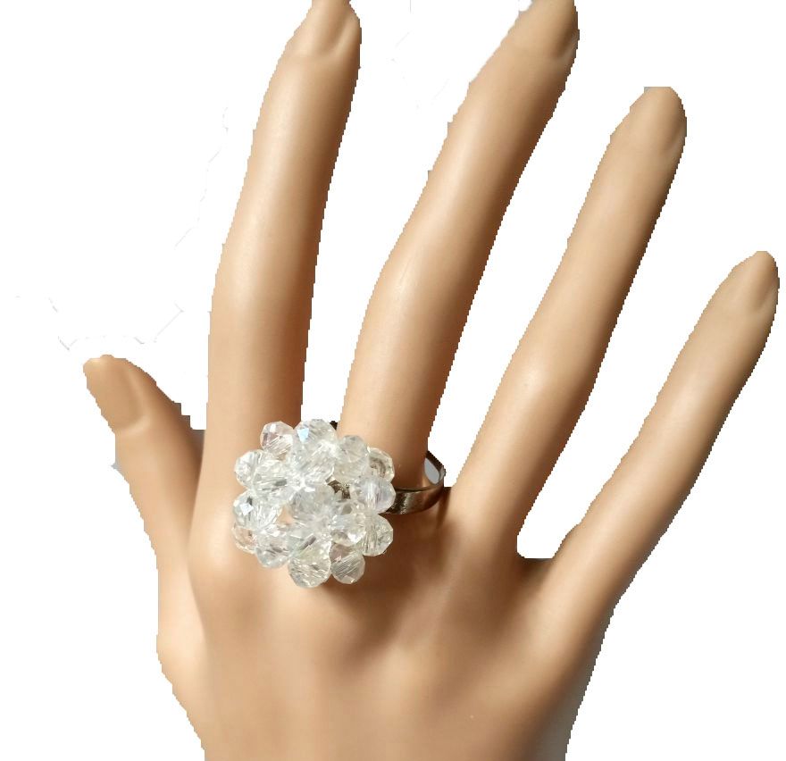 Ladies white crystal ring with metallic band very fashionable, durable and is easy and comfortable to wear.