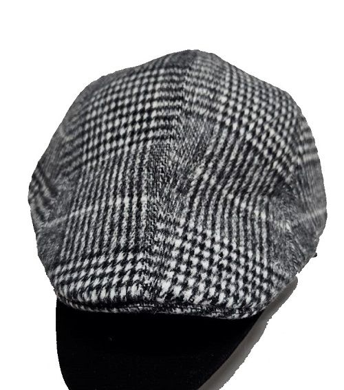 A checked newsboy cap easy and comfortable to wear, fashionable and durable to have readily avilable.