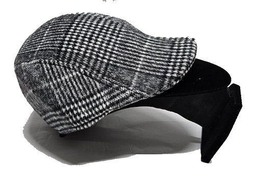 A checked newsboy cap easy and comfortable to wear, fashionable and durable to have readily avilable.