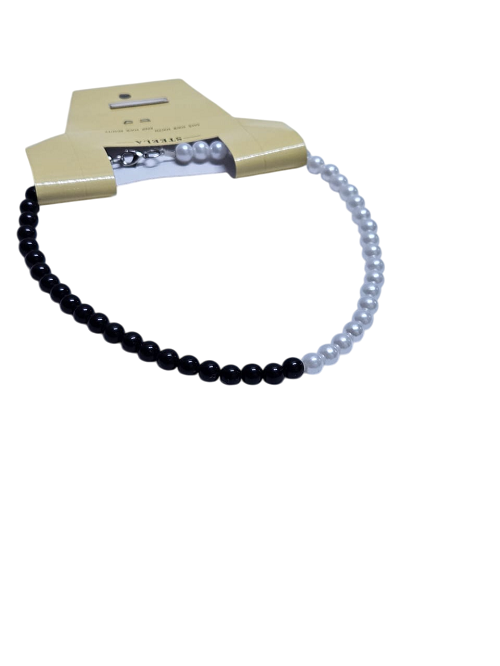 A black and white medium pearl necklace easy and comfortable to wear, durable ,fashionable and best gift to gift to your friends.