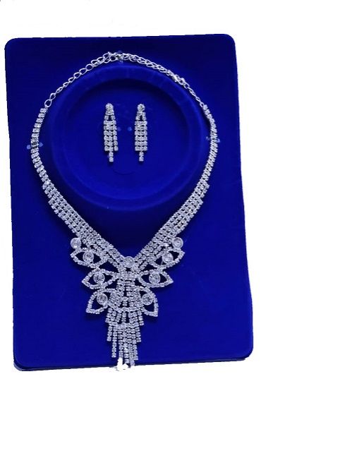 Ladies floral crystal silver jewelry set of necklace and matching earrings easy and comfortable to wear and fashionable to have.