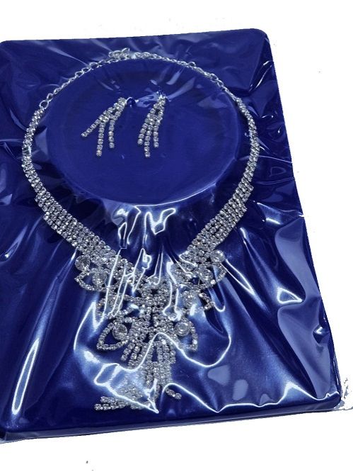 Ladies floral crystal silver jewelry set of necklace and matching earrings easy and comfortable to wear and fashionable to have.