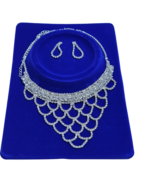 Ladies embellished silver crystal jewelry set of a necklace and a matching earrings fashionable and durable .