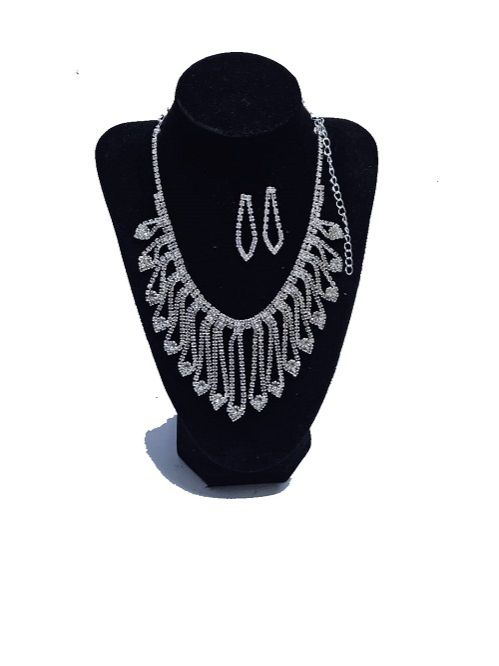 Ladies silver plated cubic jewelry set of a necklace and a matching earrings fashionable and durable to have.