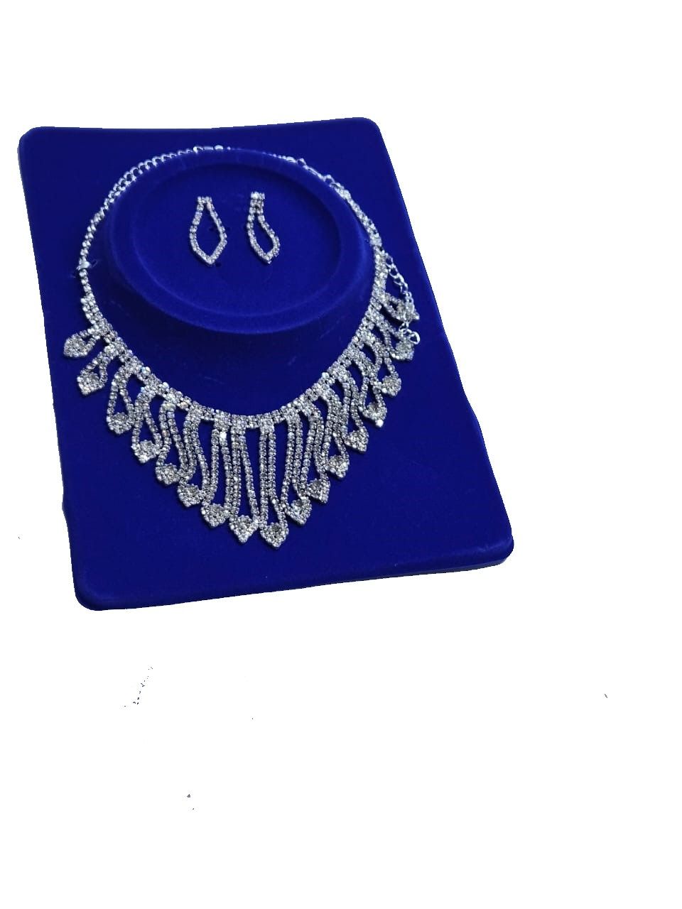 Ladies silver plated cubic jewelry set of a necklace and a matching earrings fashionable and durable to have.