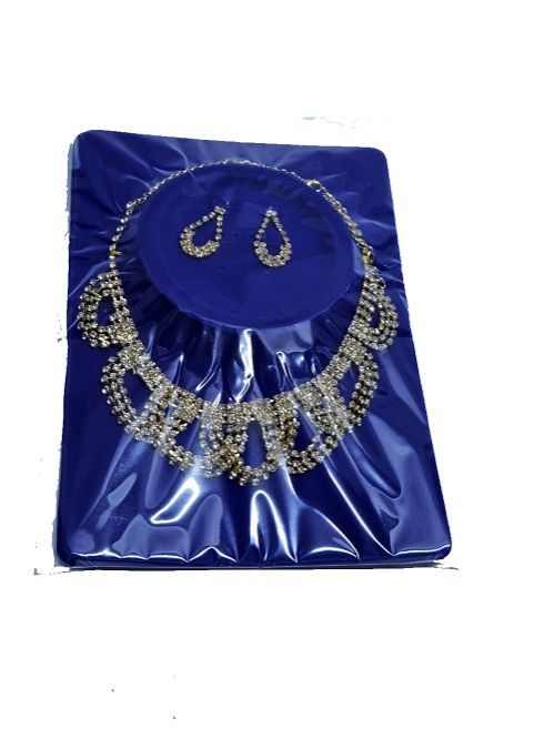 Ladies gold plated jewelry set of a necklace and matching earrings very fashionable and durable to have.