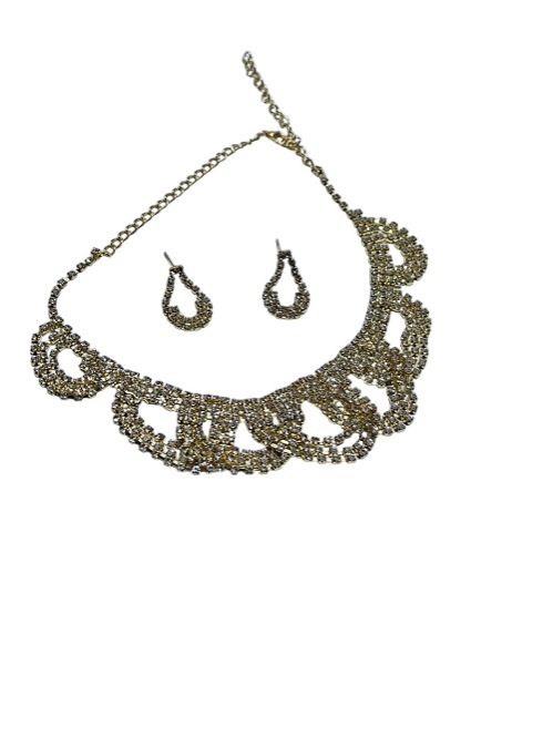 Ladies gold plated jewelry set of a necklace and matching earrings very fashionable and durable to have.