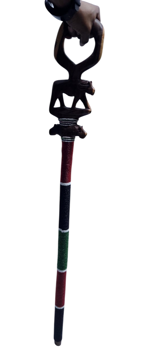 A dark brown Kenyan Maasai beaded walking stick easy and comfortable to carry and is fashionable, durable.