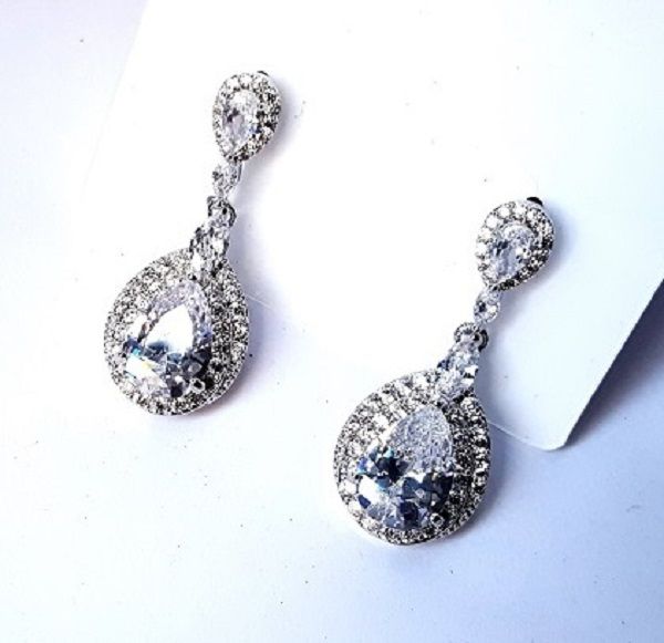Ladies charming dangle silver earrings easy and comfortable to wear, durable fashionable and best gift to offer to your female friends